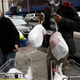 A volunteer hands out free turkeys in Brooklyn, N.Y., Nov. 26, 2013.
Spencer Platt/Getty Images